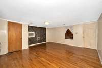 Living Room- wood flooring, crown molding