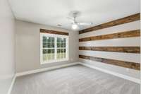 Bedroom 2 is upstairs and has wood accents; ready to decorate to your heart's content...