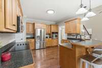 Stainless steel appliances (oven, microwave and dishwasher) convey and the refrigerator is negotiable...