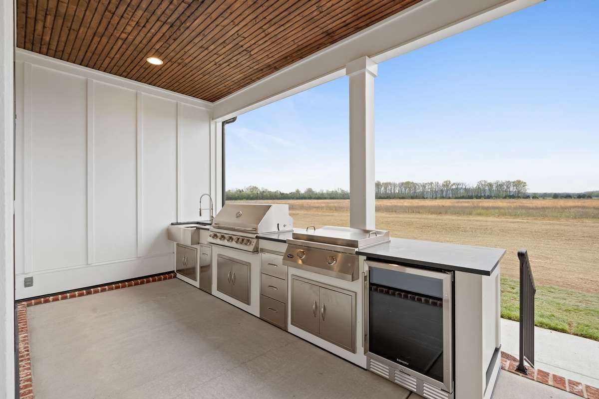 OUTDOOR KITCHEN WITH GRILL, GRIDDLE, SINK AND FRIDGE