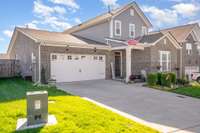 Attached 2 car garage and plenty of paved parking