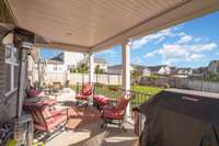 covered patio with spacious seating area all year round