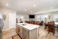 built in dishwasher and sink provides quick and easy clean up