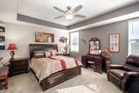 designer paint and trey ceilings complete with fan and accent walls