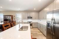 TONS of kitchen cabinets to store all of your culinary needs