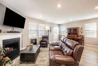 chill out in front of the TV and cozy up to the fireplace