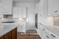 IMAGES - PREVIOUSLY BUILT HOME: Kitchen - Illustrative Purposes Only