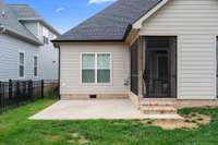This custom home offers an extra concrete pad area that's perfect for your BQ grill and extra seating for your and your guests.
