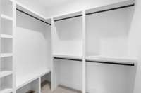 The Primary Closet is roomy and includes custom shelving to allow for folding your sweaters and jeans if needed!