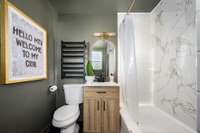 Another look at the bathroom. Heated towel rack, new toilet, new sink & faucets.