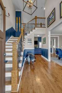 Step inside to beautiful real hardwood floors and a stunning staircase—this home welcomes you with warmth and timeless elegance.