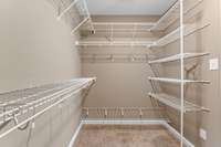 Huge walk-in closet from the primary bath