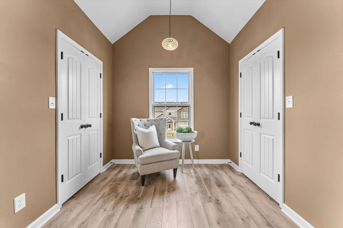 Sitting area with two walk-in closets!