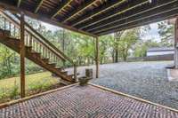 Patio underneath the deck that can be a private reading area, or a party space.