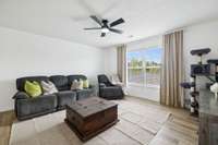 All new flooring, new ceiling fan and fresh paint in the large bonus room!