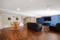 View of the cafe area and the perfect dart board wall!  TV in this photo conveys.