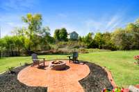 Closer view of the stamped concrete patio and fire pit.  Notice the private setting?