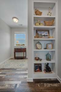 All bedrooms are located upstairs, as well as a landing area with bookcase. Perfect for a home office area or homework area for your students!