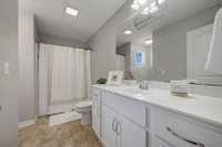 Full bathroom located right outside the second and third bedrooms.