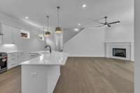 Just off the dining area and kitchen, you’ll find convenient access to the second-level bonus room and additional storage, perfect for flexibility and function.