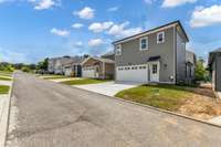 ChatGPT said:
The rear of the home offers convenient access via a quiet alley-style street with private driveway and garage parking, keeping the front of the home peaceful, uncluttered, and free of street traffic.