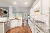 There are stainless appliances including a 5 burner gas cooktop.