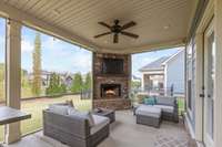 The screened patio has a wood burning fireplace.