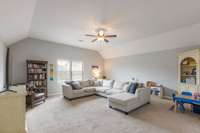 The large bonus room is upstairs and has a large closet.