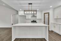 SAMPLE PHOTO - Previous photo of similar kitchen designed by Bison Developments. Photo to show sample finishes in similar kitchen design.