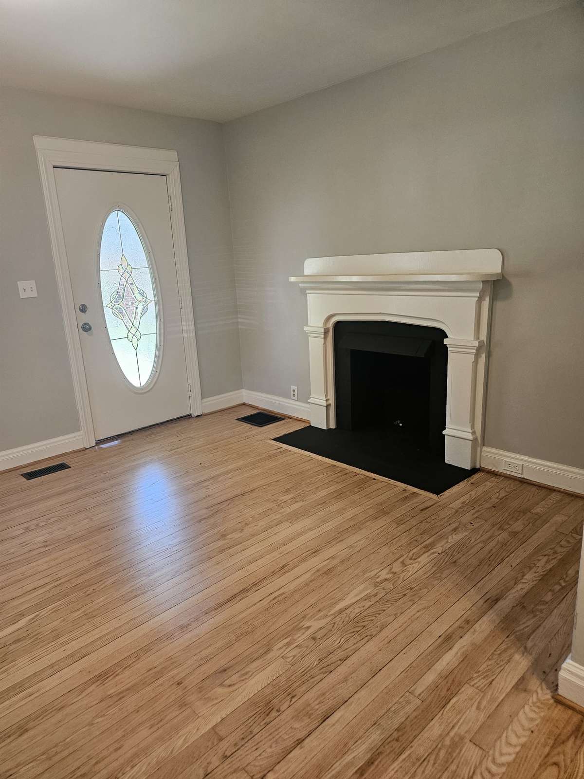 Front Living with Decorative Fireplace
