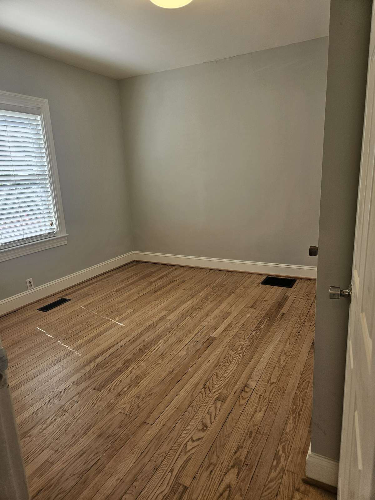 Bedroom #2 with resurfaced floors