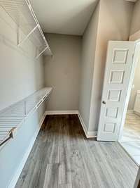 Primary bedroom walk in closet.

*Photo is from a previous listing displaying the completed floor plan some options and selections may vary from actual home.