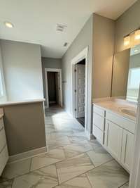 Primary Bathroom

*Photo is from a previous listing displaying the completed floor plan some options and selections may vary from actual home.