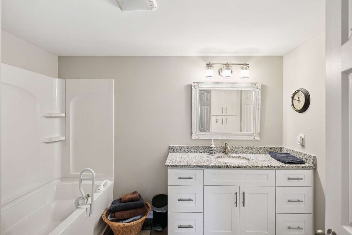 Primary bath has a shower/tub and a single vanity sink.  4775 New Tullahoma Hwy Manchester TN 37355