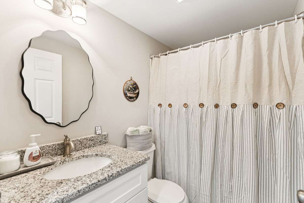 Full bath with a single vanity sink.  4775 New Tullahoma Hwy Manchester TN 37355