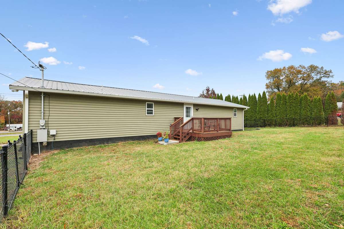 Fully fenced in backyard with tree line for privacy.  4775 New Tullahoma Hwy Manchester TN 37355