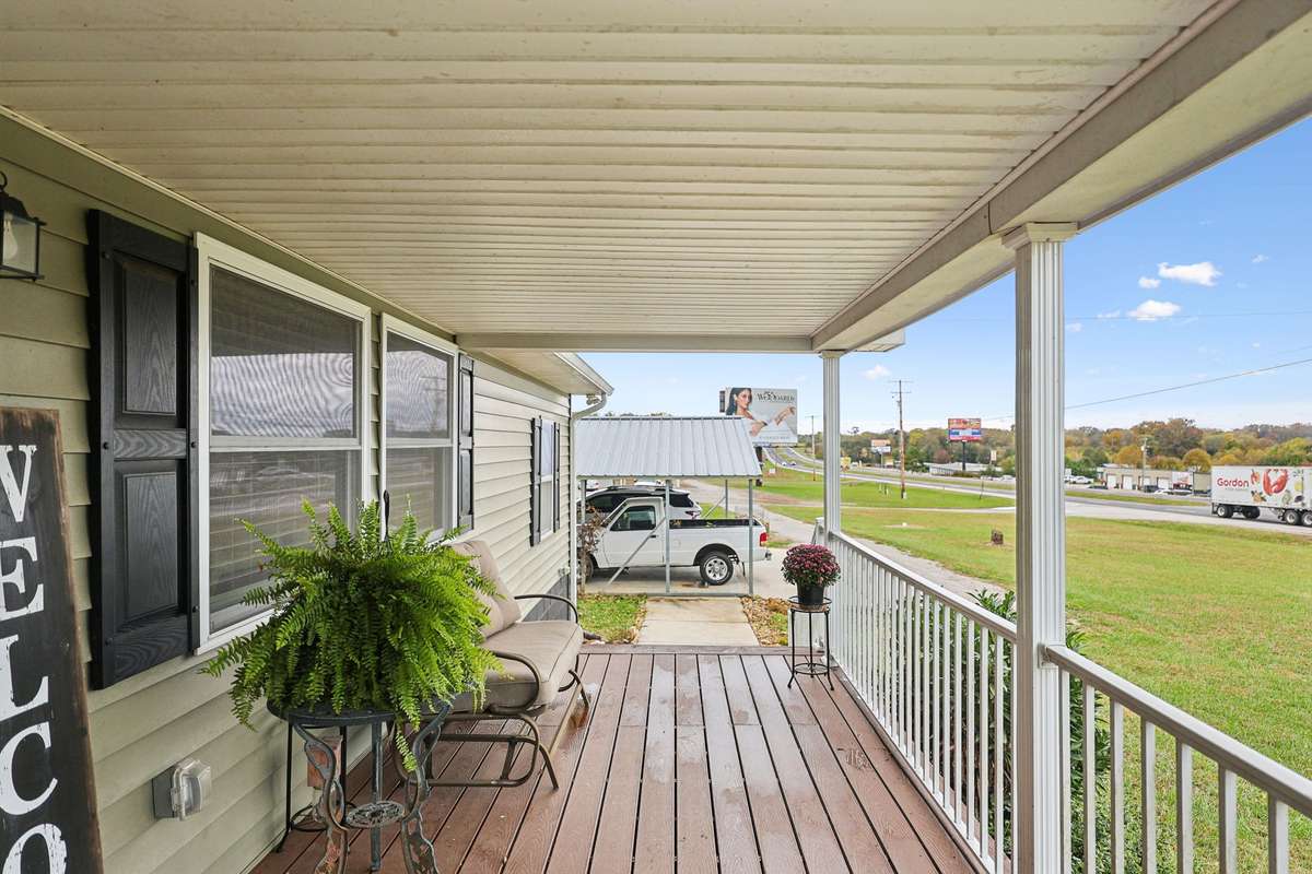 Large covered front porch, perfect for drinking coffee.  4775 New Tullahoma Hwy Manchester TN 37355