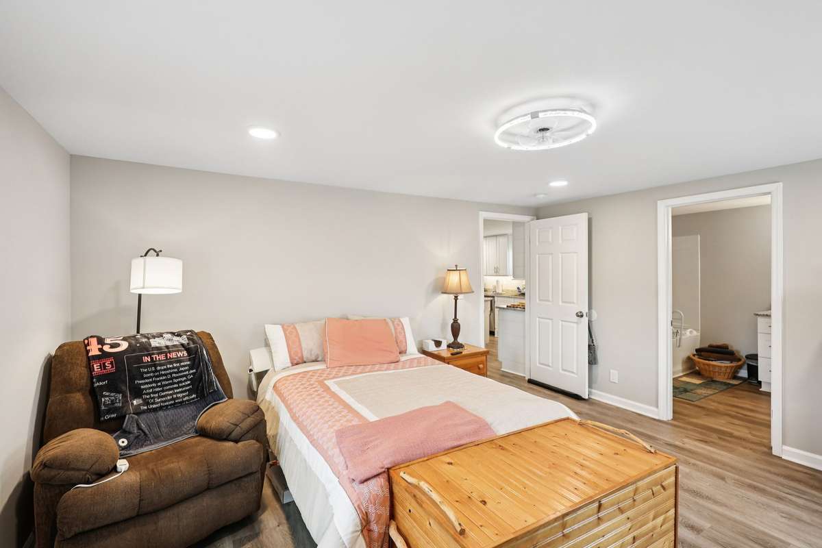 Primary bedroom also has a modern over head light fixture.  4775 New Tullahoma Hwy Manchester TN 37355