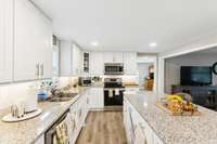 Kitchen has crisp white cabinets and stainless steel appliances.  4775 New Tullahoma Hwy Manchester TN 37355