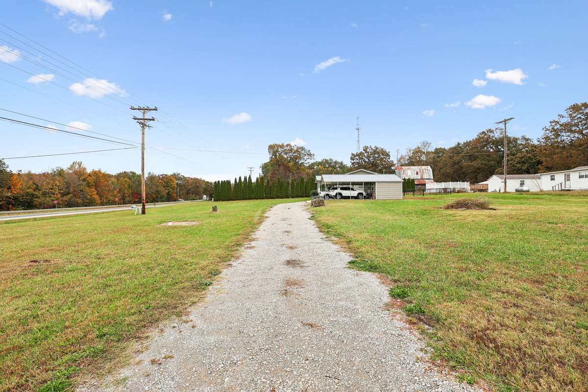 Long off the road driveway creates the perfect retreat.  4775 New Tullahoma Hwy Manchester TN 37355