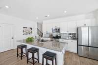 Open concept kitchen to socialize with family and friends.