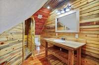 Upstairs bedroom has it's own very cute & rustic en suite bathroom