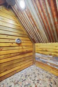 Upstairs bedroom has it's own very cute & rustic en suite bathroom