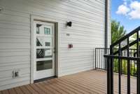 This second-floor unit is conveniently accessible by a single flight of stairs or via the building’s elevator.