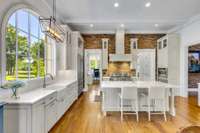 x-Large Gourmet Kitchen with New Quarts Counters and marble with inlaid mother of pearl.