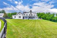 Lawn/home view from barn sidewalk