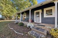 Covered stone front porch.  3007 Fullerton Ln College Grove Tn 37046