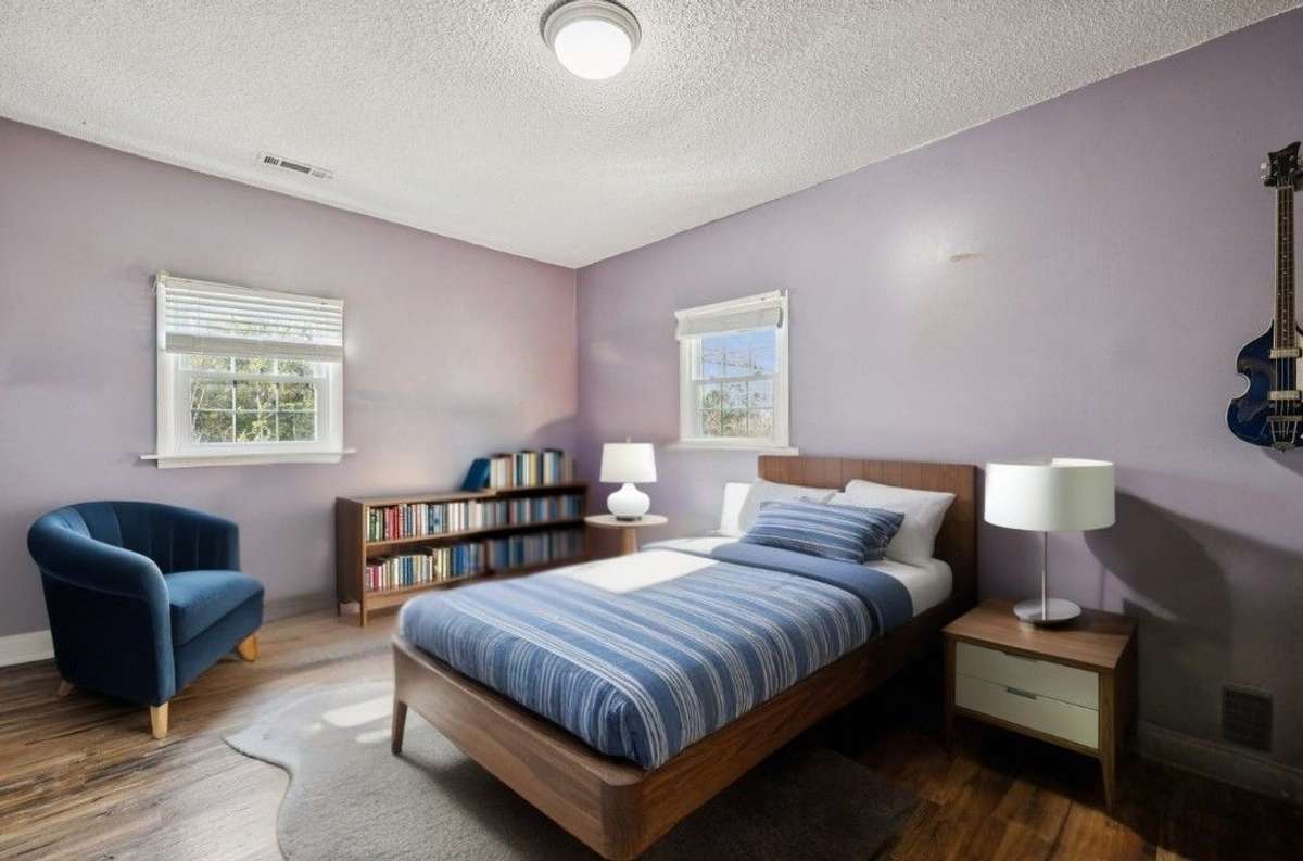 First bedroom offers multiple windows and plenty of space.  3007 Fullerton Ln College Grove Tn 37046