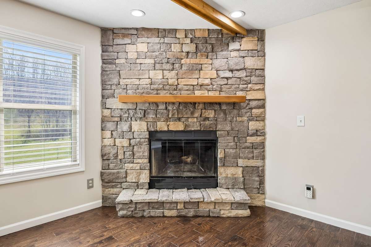 Wood burning stone fireplace.