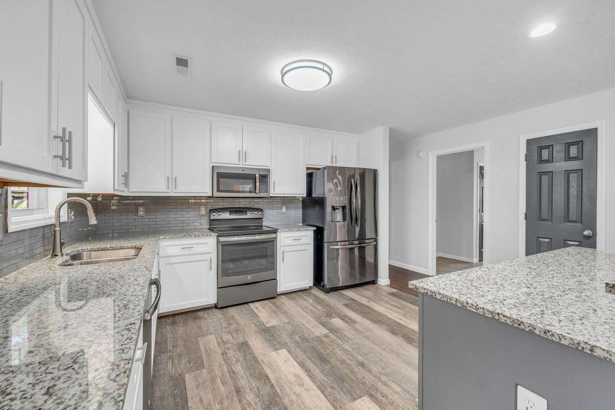 Soft close cabinets and drawers, stainless appliances.